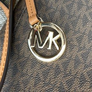 Michael Kors purse. Tan and brown, like new condition